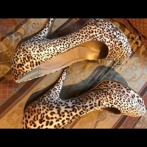 Gorgeous Cheetah shoes size 8. Worn once for hour